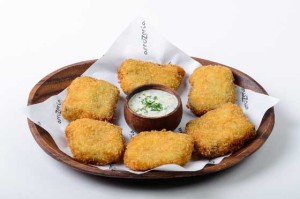  Lengua Frita, a melt-in-your-mouth Angus beef tongue coated in béchamel sauce and breadcrumbs, deep-fried like croquetas
