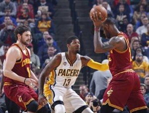 Paul George (No. 13) of the Indiana Pacers defends against LeBron James (No. 23) of the Cleveland Cavaliers in the first half of the game at Bankers Life Fieldhouse in Indianapolis, Indiana. AFP PHOTO