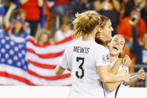 Alex Morgan No.13 of the United States (center) celebrates after she scored a goal in the second half of their game against Trinidad and Tobago during their Semifinal of the 2016 CONCACAF Women’s Olympic Qualifying at BBVA Compass Stadium on Saturday in Houston, Texas. AFP PHOTO 