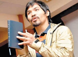 Manny Pacquiao delivers a message during a Bible study session. CONTRIBUTED PHOTO