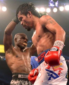 Timothy Bradley of US and Manny Pacquiao of Philippines listen to the final bell during their WBO World Welterweight Championship title match at the MGM Grand Arena in Las Vegas, Nevada on April 12,2014. AFP PHOTO