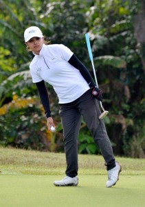 Princess Superal checks the line of her putt on No. 3. CONTRIBUTED PHOTOS