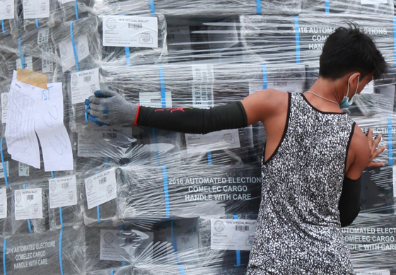 Comelec ballots are unloaded from a truck by warehouse personnel to a Comelec rented storage house in Marikina City. The ballots are part of the verified ballots to be used in the 2016 May elections.  Photo by RUY L. MARTINEZ