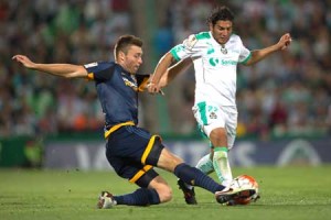 Martin Bravo (right) of Mexican club Santos vies for the ball with Robbie Rogers (left) of US LA Galaxy, during their CONCACAF Champions League quarterfinals football match at the Corona stadium on Wednesday in Torreon, Mexico. AFP PHOT