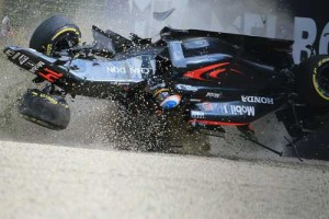 In this photo taken on March 20, 2016, McLaren Honda’s Spanish driver Fernando Alonso crashes into the wall after colliding with Haas F1 Team’s Brazilian driver Esteban Gutierrez during the Formula One Australian Grand Prix in Melbourne. AFP PHOTO