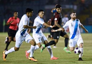 USA’s De Andre Yedlin (second right) kicks the ball as Guatemala’s Moises Hernandez (L), Rafael Morales (second left) and Jean Marquez mark him during their Russia 2018 FIFA World Cup Concacaf Qualifiers’ football match, in Guatemala City, on Saturday. AFP PHOTO