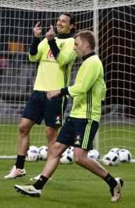 Swedish national soccer players Zlatan IbrahimoviC (left) and Sebastian Larsson take part in a training session at the Friends Arena in Stockholm, Sweden, on Monday, ahead of Tuesday’s friendly soccer match against Czech Republic. AFP PHOTO