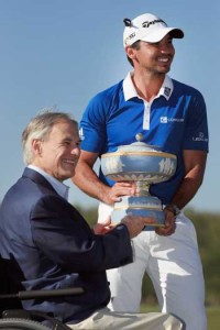 Jason Day of Australia proudly holds the Walter Hagen Cup with the Governor of Texas Greg Abbott after his 5&4 victory over Louis Oosthuizen in the championship match of the World Golf Championships-Dell Match Play at the Austin Country Club on Monday in Austin, Texas. AFP PHOTO