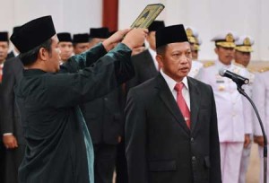The new chief of the national counter-terrorism agency, Tito Karnavian, is sworn in during an official ceremony at the Presidential Palace, in Jakarta. AFP PHOTO