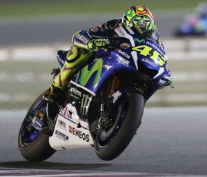 Italian rider Valentino Rossi of Movistar Yamaha presses the attack during the Qatar Moto Grand Prix race on Monday at the Losail International Circuit in the Qatari capital Doha. AFP PHOTO