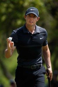 Rory McIlroy of Northern Ireland waves to the gallery on the sixth green during the round of 8 in the World Golf Championships-Dell Match Play at the Austin Country Club  on Sunday in Austin, Texas. AFP PHOTO 