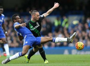 Chelsea’s Nigerian midfielder John Obi Mikel (left) vies with Stoke City’s Austrian striker Marko Arnautovic during the English Premier League football match between Chelsea and Stoke City at Stamford Bridge in London on Sunday. AFP PHOTO