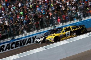 Kevin Harvick, driver of the No. 4 Jimmy John’s Chevrolet, beats Carl Edwards, driver of the No. 19 Stanley Toyota, to the checkered flag to win the NASCAR Sprint Cup Series Good Sam 500 at Phoenix International Raceway on Monday in Avondale, Arizona. AFP PHOTO