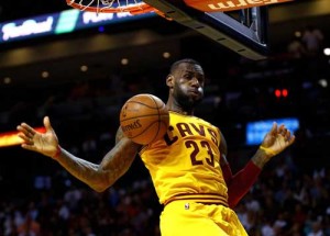 LeBron James No.23 of the Cleveland Cavaliers dunks during a game. AFP PHOTO