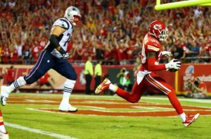 Husain Abdullah of the Kansas City Chiefs scores a touchdown after an interception against the New England Patriots, at Arrowhead Stadium in Kansas City, Missouri, on September 29, 2014. AFP FILE PHOTO 