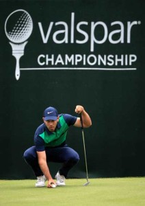 Charl Schwartzel of South Africa lines up a putt on the 18th green during the final round of the Valspar Championship at Innisbrook Resort Copperhead Course on Monday in Palm Harbor, Florida. AFP PHOTO