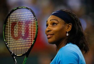 Serena Williams of USA reacts after defeating Agnieszka Radwanska of Poland in straight sets during day twelve of the BNP Paribas Open at Indian Wells Tennis Garden on Saturday in Indian Wells, California. AFP PHOTO