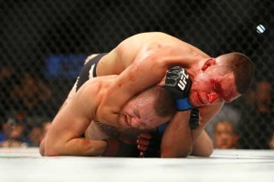 Nate Diaz applies a choke hold to win by submission against Conor McGregor during UFC 196 at the MGM Grand Garden Arena in Las Vegas, Nevada on Saturday (Sunday in Manila). AFP PHOTO