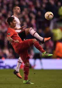 Manchester United’s French midfielder Morgan Schneiderlin (right) vies with Liverpool’s Brazilian midfielder Roberto Firmino during the UEFA Europa League round of 16, first leg football match between Liverpool and Manchester United at Anfield in Liverpool, northwest England on Friday. AFP PHOTO 