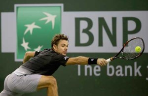 Stan Wawrinka of Switzerland returns a shot against Illya Marchenko during the BNP Paribas Open at the Indian Wells Tennis Garden on March 11 at Indian Wells Tennis Garden on Sunday in Indian Wells, California. AFP PHOTO