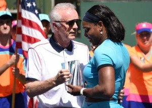 Indian Wells Tennis Garden CEO Raymond Moore (left) presenting the second place trophy to Serena Williams of USA after the women’s final of the BNP Paribas Open at the Indian Wells Tennis Garden in Indian Wells, California, March 20, 2016. AFP PHOTO