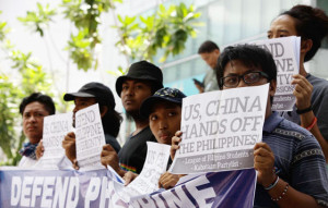 HoLIdAY RALLY Protesters hold a rally in front of the Chinese consulate in Makati city to Mark Araw ng Kagitingan (day of valor), a legal holiday in the country. The group called on China to stop its incursions on Philippine territory. PHoto by CZEASAR DANCEL