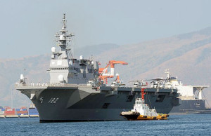 GOODWILL VISIT Japanese helicopter carrier Ise is towed as it prepares to dock at Subic port on Tuesday. The ship is in the Philippines for a four-day goodwill visit. AFP PHOTO 