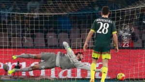 AC Milan’s goalkeeper Gianluigi Donnarumma dives as the ball enters the net during the Italian Serie A football match SSC Napoli vs AC Milan on February 22, at the San Paolo stadium in Naples. AFP PHOTO