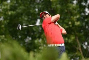 Felipe Aguilar of Chile hits a shot during round two of the Volvo China Open golf tournament at the Topwin Golf and Country Club in Beijing. AFP PHOTO