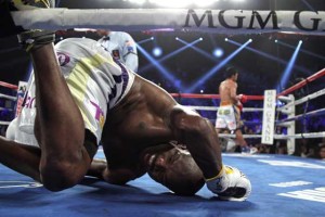 DOWN TO THE MAT Manny Pacquiao walks to a neutral corner after sending Timothy Bradley Jr. to the mat in the 10th round of their WBO International Welterweight title bout at the MGM Grand Arena in Las Vegas, Nevada. AFP PHOTO