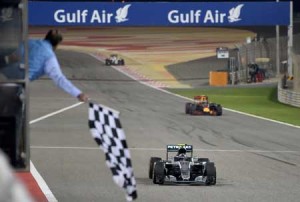 Mercedes AMG Petronas F1 Team’s German driver Nico Rosberg drives over the finish line of the Formula One Bahrain Grand Prix at the Sakhir circuit in the desert south of the Bahraini capital, Manama, on Monday. AFP PHOTO