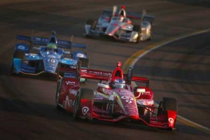 Scott Dixon of New Zealand, driver of the No. 9 Target Chip Ganassi Racing Chevrolet IndyCar leads Tony Kanaan of Brazil, driver of the No. 10 Chip Ganassi Racing Teams Chevrolet IndyCar and Will Power of Australia, driver of the No. 12 Team Penske Chevrolet IndyCar during the Phoenix Grand Prix at Phoenix International Raceway on Sunday in Avondale, Arizona. AFP PHOTO