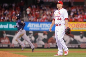 Trevor Rosenthal No.44 of the St. Louis Cardinals stands at the rear of the mound as Domingo Santana No.16 of the Milwaukee Brewers rounds the bases after hitting a two-run home run during the ninth inning at Busch Stadium on Thursday in St. Louis, Missouri.  AFP PHOTO 