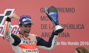 Marc Marquez of Honda celebrates on the podium after winning the MotoGP race of the Argentina Grand Prix at the Termas de Rio Hondo circuit, in Santiago del Estero, Argentina, on April 3.  AFP PHOTO 