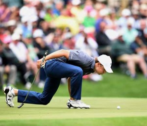 US golfer Jordan Spieth blows the ball on the 9th hole during the Par 3 contest prior to the start of the 80th Masters of Tournament at the Augusta National Golf Club on Thursday, in Augusta, Georgia. AFP PHOTO