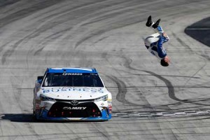 Carl Edwards, driver of the No. 19 Comcast Business Toyota, celebrates after winning the NASCAR Sprint Cup Series Food City 500 at Bristol Motor Speedway on Sunday in Bristol, Tennessee. AFP PHOTO