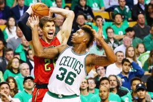 Boston, Massachusetts: Marcus Smart No.36 of the Boston Celtics defends Kyle Korver No.26 of the Atlanta Hawks during the fourth quarter of Game Six of the Eastern Conference Quarterfinals during the 2016 NBA Playoffs at TD Garden on Friday in Boston, Massachusetts. AFP PHOTO 