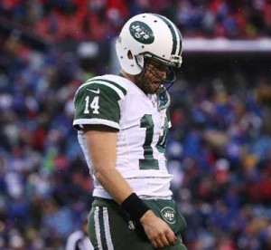 Ryan Fitzpatrick of the New York Jets walks off the field after throwing his third interception of the day in a 22-17 loss to the Buffalo Bills on January 3, in Orchard Park, New York. AFP FILE PHOTO