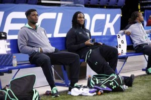 Injured linebackers Myles Jack (left) of UCLA and Jaylon Smith of Notre Dame look on during the 2016 NFL Scouting Combine at Lucas Oil Stadium on February 28, 2016 in Indianapolis, Indiana. The NFL dream was still alive for Smith and Jack who were selected on the second day of the draft on April 29 despite concerns over knee injuries that disrupted their college football careers. AFP PHOTO