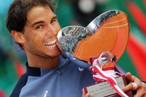 Spain’s Rafael Nadal holds his trophy during the awarding ceremony following the final tennis match against France’s Gael Monfils at the Monte-Carlo ATP Masters Series Tournament in Monaco on Monday. Nadal defeated Monfils 7-5, 5-7, 6-0 to win a record ninth title at the Monte Carlo Masters. AFP PHOTO