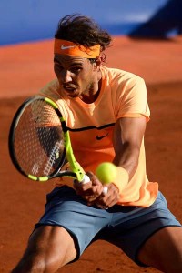 Spanish tennis player Rafael Nadal returns the ball to Japanese tennis player Kei Nishikori during the final of the ATP Barcelona Open “Conde de Godo” tennis tournament in Barcelona on Monday. AFP PHOTO