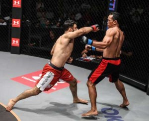 Jimmy Yabo (right) defeats Bashir Ahmad by knockout at 0:21 minutes of Round 1. PHOTO COURTESY OF ONE CHAMPIONSHIP