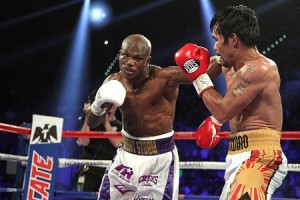 Timothy Bradley Jr. throws a left at Manny Pacquiao during their WBO International Welterweight title bout at the MGM Grand Arena on April 9 in Las Vegas, Nevada. Pacquio won a 12-round unanimous decision to capture the WBO International Welterweight Title. AFP PHOTO