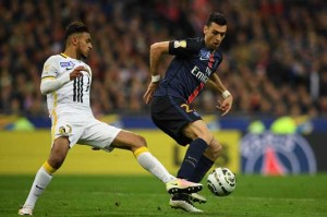 Paris Saint-Germain’s Argentinian midfielder Javier Pastore (right) vies with Lille’s French midfielder Sofiane Boufal during the French League Cup final football match Paris Saint-Germain (PSG) vs Lille (LOSC) on Sunday at the Stade de France stadium in Saint-Denis, north of Paris.  AFP PHOTO