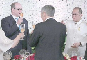 ROYAL GUEST President Benigno Aquino 3rd toasts Prince Albert II in Malacañang on Thursday. CONTRIBUTED PHOTO