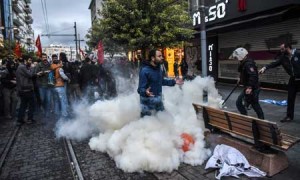 Turkish anti-riot police use tear gas to disperse demonstrators during a protest against a call for the country to adopt a religious constitution. AFP PHOTO