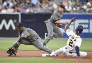 Melvin Upton Jr. (No. 2) of the San Diego Padres steals second base ahead of the throw to Jean Segura of the Arizona Diamondbacks during the second inning of a baseball game at PETCO Park in San Diego, California.  AFP PHOTO