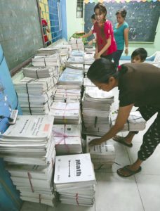 GETTING READY Teachers at the Payatas B Elementary School in Quezon City (Metro Manila) arrange and clean preowned and old books to be used by students when they return to school in June. PHOTO BY MIKE DE JUAN 