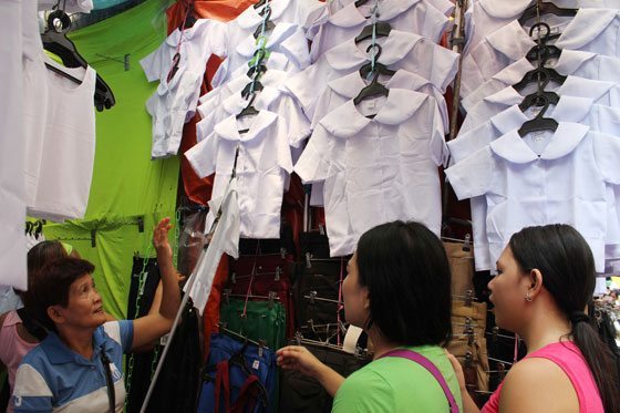 Mothers shop for uniforms and other school supplies in Quiapo, Manila in preparation for the opening of classes in June. PHOTO BY MARY ROSE PIANO 