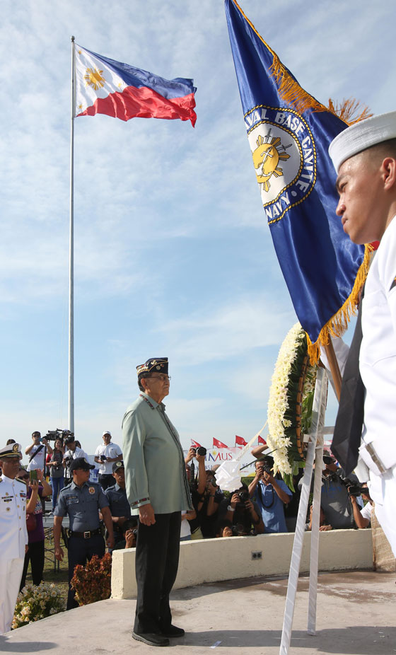 Former President Fidel Ramos stands at attention during the hoisting of a huge flag in Alapan, Imus Cavite. The event commemorates the victory of the Philippine Revolutionary Army against Spanish forces in what is now known as the Battle of Alapan on May 28, 1898. PHOTO BY RUSSELL PALMA